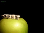 Apple en dados, sobre manzana