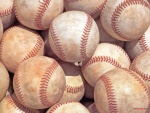 Un montón de pelotas de béisbol