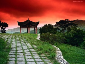 Postal: Templo japonés bajo un cielo rojo