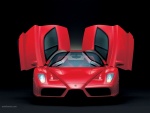 Ferrari rojo con las puertas abiertas