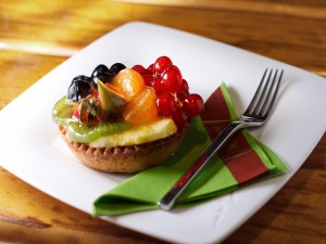 Postal: Delicioso cheesecake con frutas y mermelada