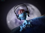 Pequeño extraterrestre escuchando música