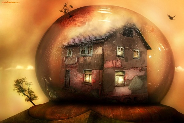 Una vieja casa dentro de una bola de cristal