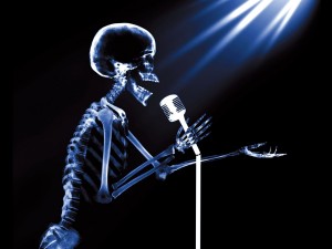 Postal: Esqueleto cantante