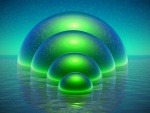 Esferas verdes saliendo del agua