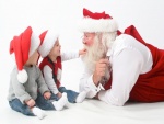 Papá Noel con dos niños