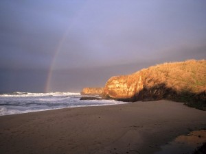Postal: Arco iris desde la playa
