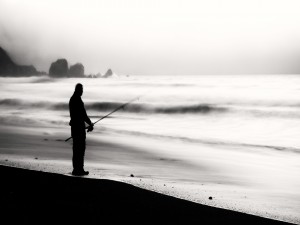 Postal: Pescando en la playa