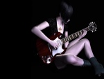 Mujer tocando la guitarra