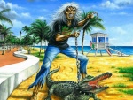 Eddie con un cocodrilo en la playa