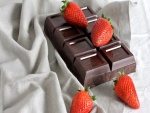 Tableta de chocolate y unas fresas