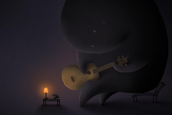 Muñeco enorme tocando la guitarra