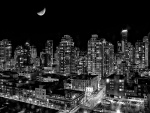 Noche con luna en la ciudad
