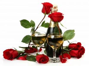 Champaña y rosas rojas