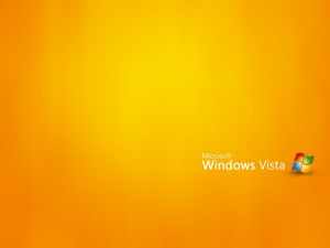 Postal: Windows Vista en fondo amarillo
