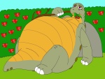 Dinosaurio tumbado y comiendo