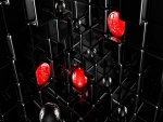 Esferas negras y rojas sobre cubos