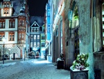 Nieve en una calle y edificios en Alemania