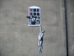 Hombre desnudo, obra del artista Banksy