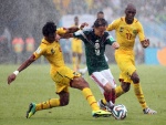 Partido bajo la lluvia México vs Camerún 2014