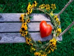 Corona de flores y corazón