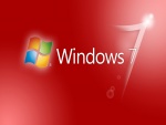 Windows 7 y logo en fondo rojo