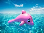 Un delfín hinchable de color rosa