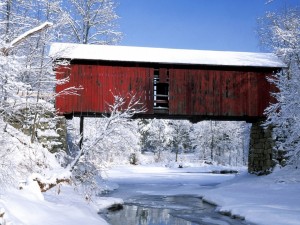 Postal: Nieve bajo el puente cubierto