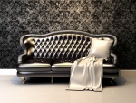 Elegante sofá con un cojín blanco
