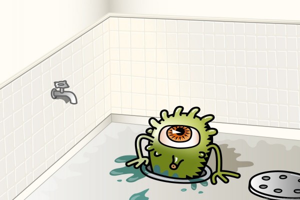 Monstruo de un solo ojo saliendo por el desagüe de la bañera