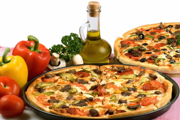 Dos ricas pizzas con vegetales