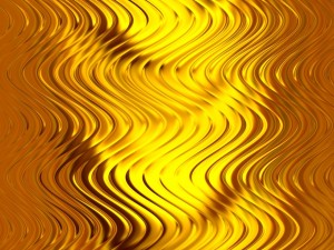 Placa de metal con curvas doradas