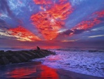 Un rojo amanecer en la playa