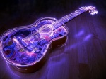 Una guitarra con luces de neón