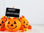 Calabazas con caramelos y ¡Feliz Halloween!
