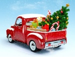 Camión de Santa con regalos y árbol para Navidad