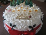 Una tarta de Navidad con renos y Santa
