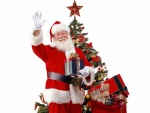 Santa Claus saludando junto al árbol de Navidad