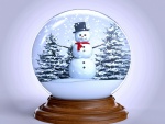 Bola de cristal con un muñeco de nieve en su interior