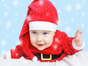 Un bebé vestido de Santa Claus