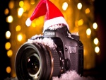 Una cámara de fotos Canon navideña
