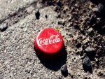 Una chapa de Coca-Cola