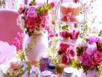 Mesa para tomar el té con bellas flores rosas