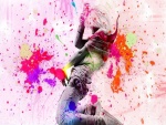 Chica danzando en una imagen con manchas de colores