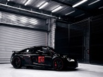 Audi R8 de color negro en un garaje