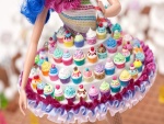 Vestido de una muñeca cubierto de cupcakes