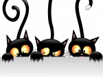Tres simpáticos gatos negros