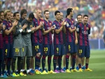 Jugadores del Fútbol Club Barcelona aplaudiendo