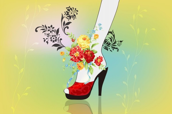 Flores sobre el pie de una mujer