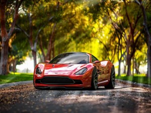 Postal: Aston Martin DBC Concept a la sombra de una arboleda